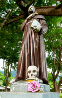 St Francis of Assisi with skull and roses