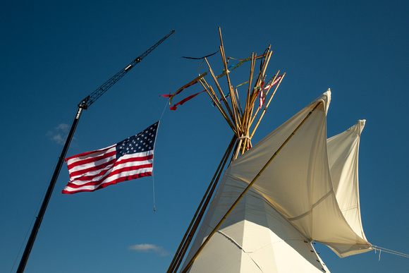 Native American tipi with US flag