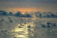 Sunset clouds by jetplane